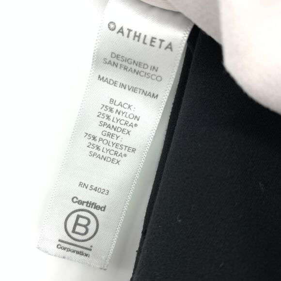 Athleta Its A Wrap 7/8 Tight Leggings Womens Size Small Black Laser Cut Detail - Picture 7 of 7